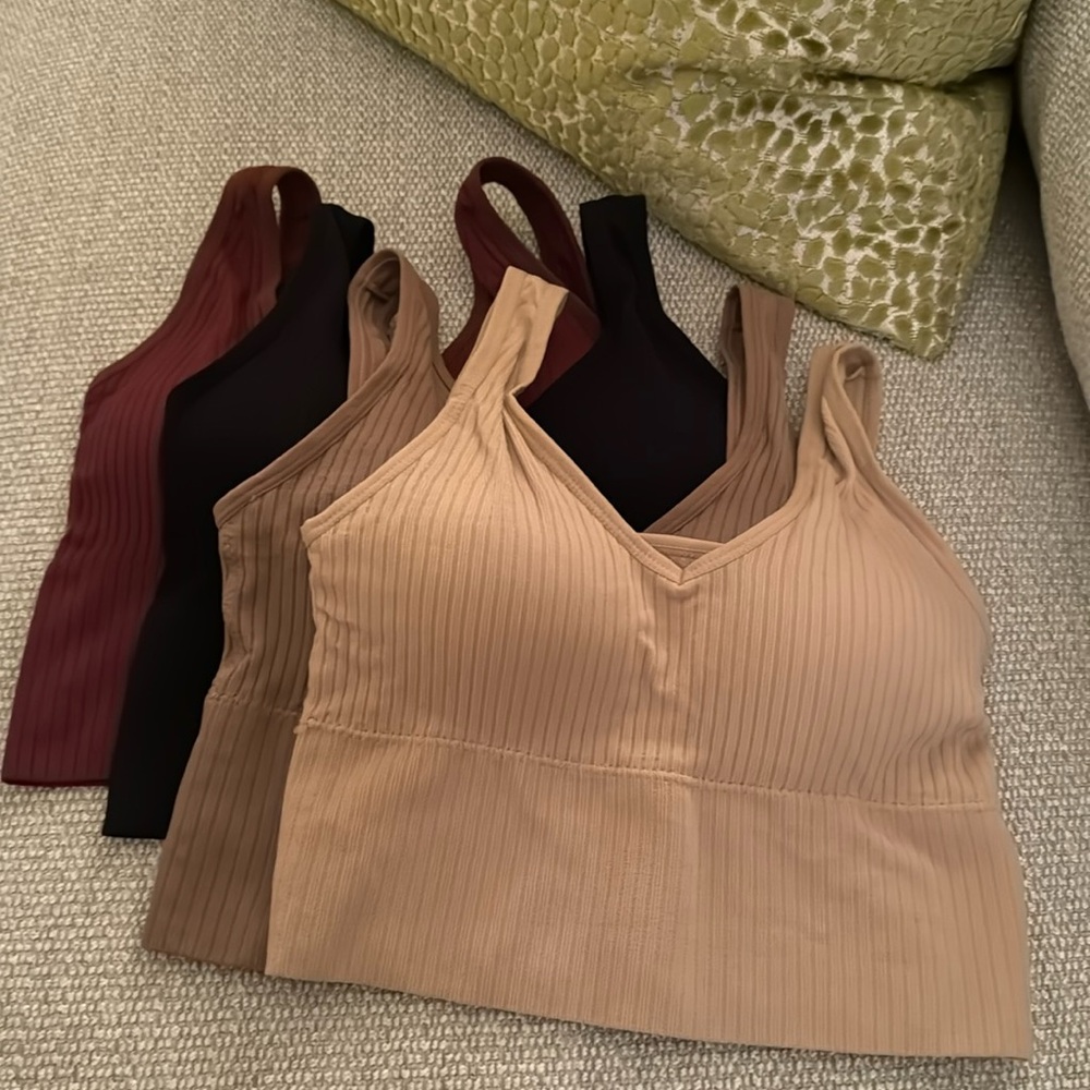 Pack of 4- built in bra/tanks. Removable Pads.